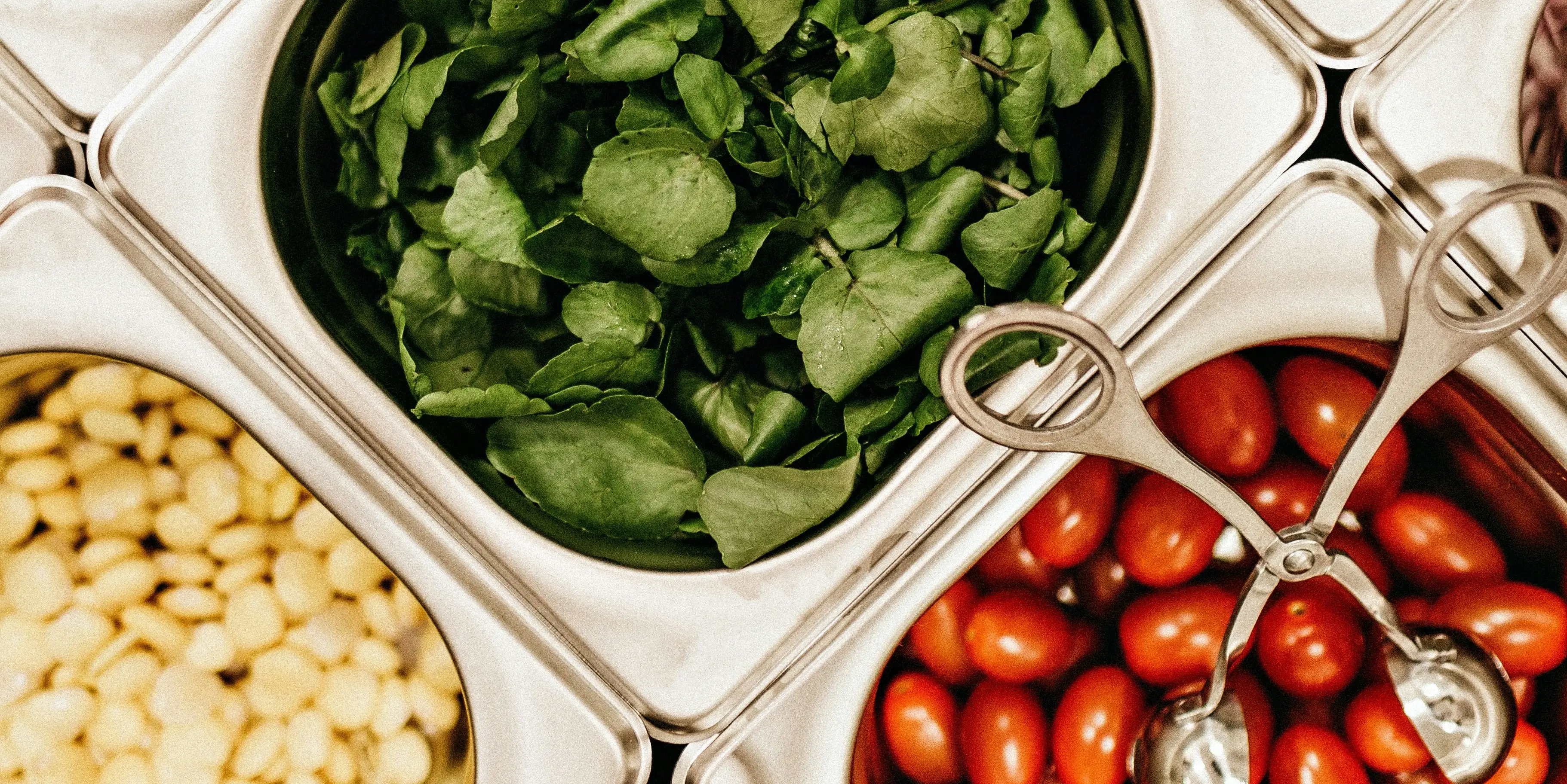 Photo of vegetables in metal containers